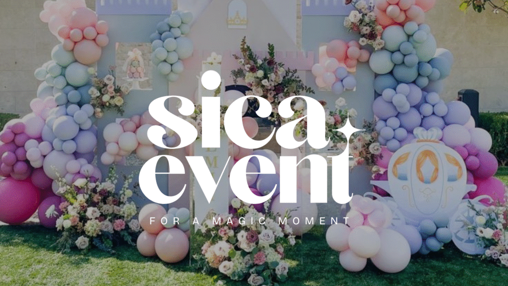 Décoration événementielle en Belgique avec arche de ballons pastel et fleurs - SICA Event